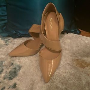 7 1/2 New Calvin Klein, Nude patten leather shoes. Never worn.